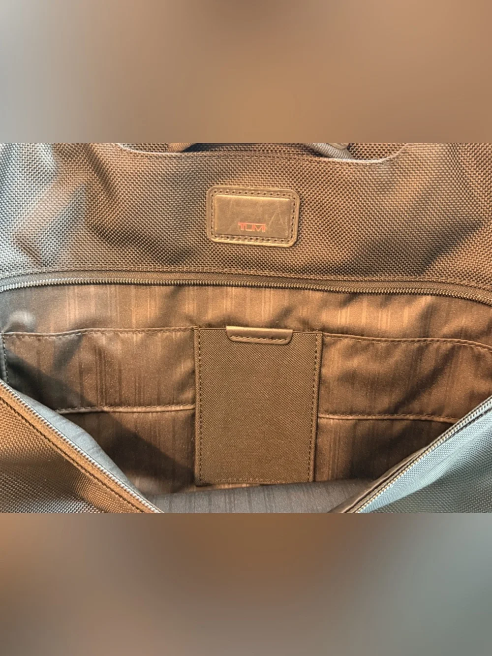 Tumi Black Travel Organizer with Red Logo